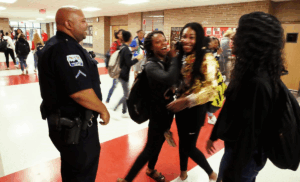 ARE SCHOOL RESOURCE OFFICERS MORE TROUBLE THAN THEY’RE WORTH? DAVENPORT SCHOOLS SAY NO