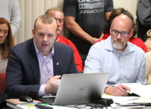 ELDRIDGE AGREES TO TERMS TO ALLOW BESEIGED POLICE CHIEF TO RETIRE