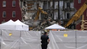 SCOTT CTY ATTORNEY PUNTS ON DAVENPOT HOTEL, ASKS STATE BOARD TO WEIGH IN