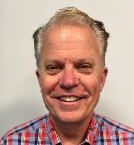 JOHN BLUNK: FORMER JOURNALIST, PRESENT COSTCO EMPLOYEE, FUTURE ALDER (PERHAPS)