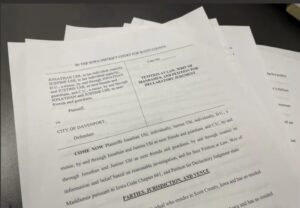 SCOTT CTY COURT RULES SUIT AGAINST DAVENPORT ALLEGING NEGLIGANCE, BRIBERY ALLOWED TO PROCEED