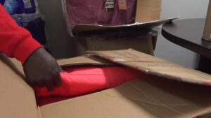 Akwaaba QC provides winter gear to those in need during annual coat drive