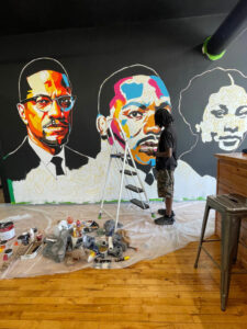 Artist brings civil-rights history to life w Davenport business mural