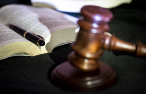 Youth wrestling YouTuber sues Iowa woman over her online comments