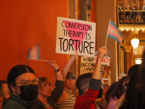 Advocates, protesters rally against “conversion therapy” bill in Iowa House