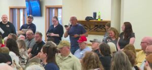Dozens crowd Mitchellville town hall, call for mayor’s resignation after fire chief firing