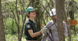 AmeriCorps team aids w removal of invasive plants at Lincoln Log Cabin, other sites