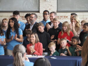 Gov Kim Reynolds signs charter school, homeschooling bill into law