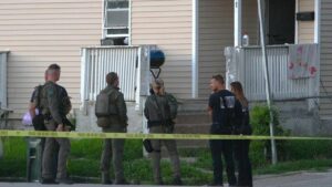 A GUN, A FLASH, A BANG, SOME TEAR GAS, AND AN ARREST 07/07 IN DOWNTOWN DAVENPORT