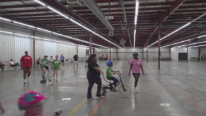 East Moline bike camp helps children w disabilities learn to ride independently