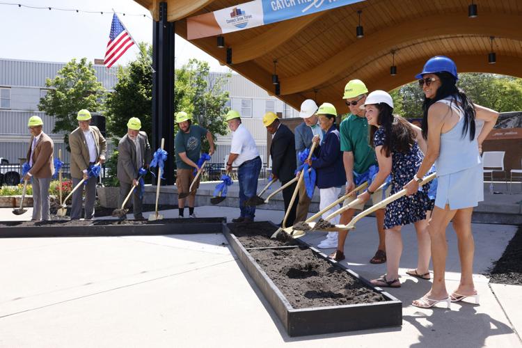 EAST MOLINE GREATER DOWNTOWN REVITALIZATION PROJECT GETS GO-AHEAD OF THE GREEN LIGHT TOWARDS HOME STRETCH OF FINISH LINE AT THE END